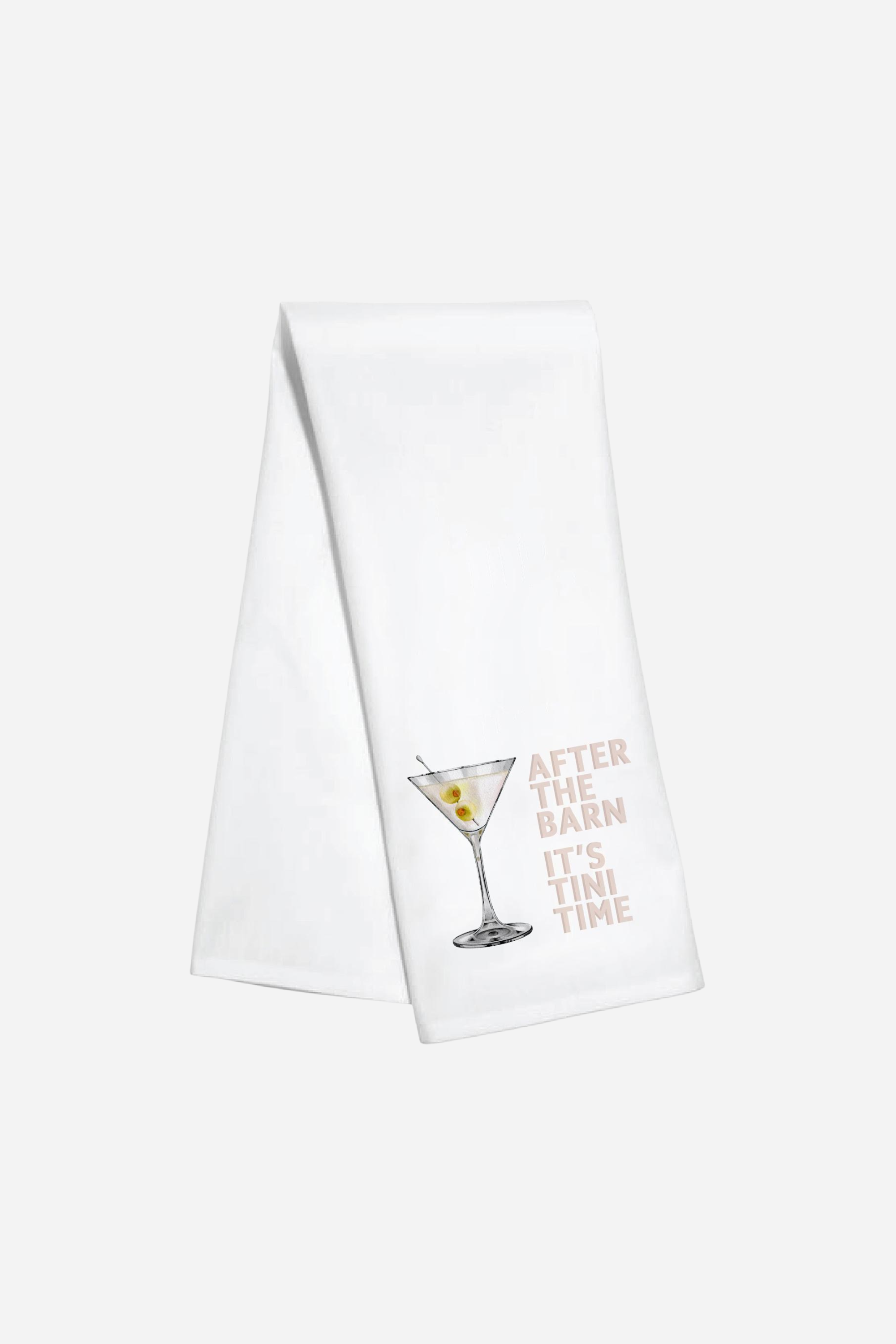 Toss Designs Tini Time Hand Towel | White tea towel featuring an illustration of a martini with olives and text "After the barn it's 'tini time," | Tini Time hand towel, equestrian tea towel, horse lover kitchen towel, funny bar towel, martini tea towel with olives, after the barn towel, stylish equestrian home decor, polyduck tea towel, horse girl gift, made in USA hand towel