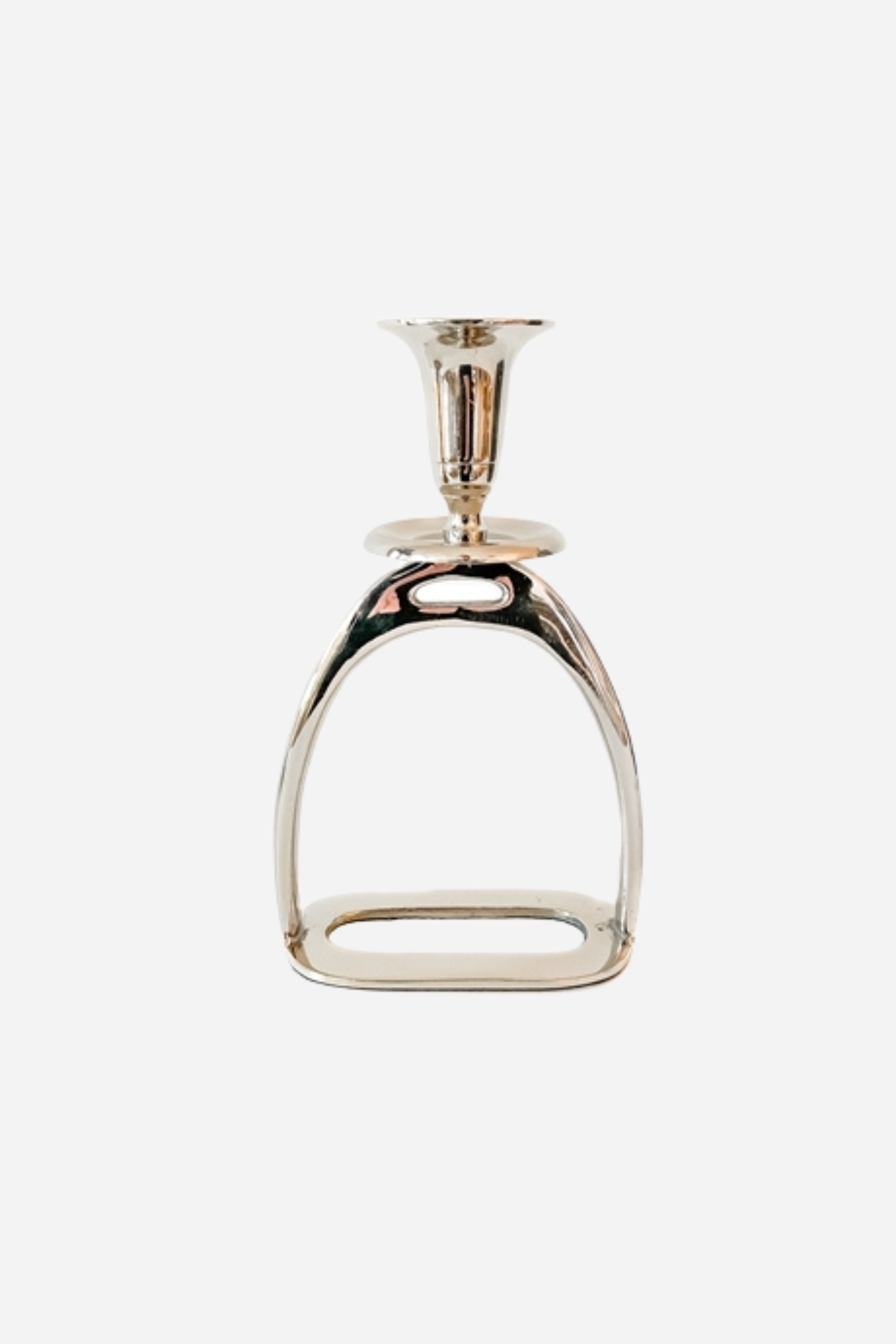 thg stylish equestrian brass stirrup candle stick holder set Silver Stirrup Candle Holder featuring a polished equestrian stirrup design that holds tapered candles. Available in small (6") and large (10") sizes, this elegant home accent adds refined equestrian charm to any space.