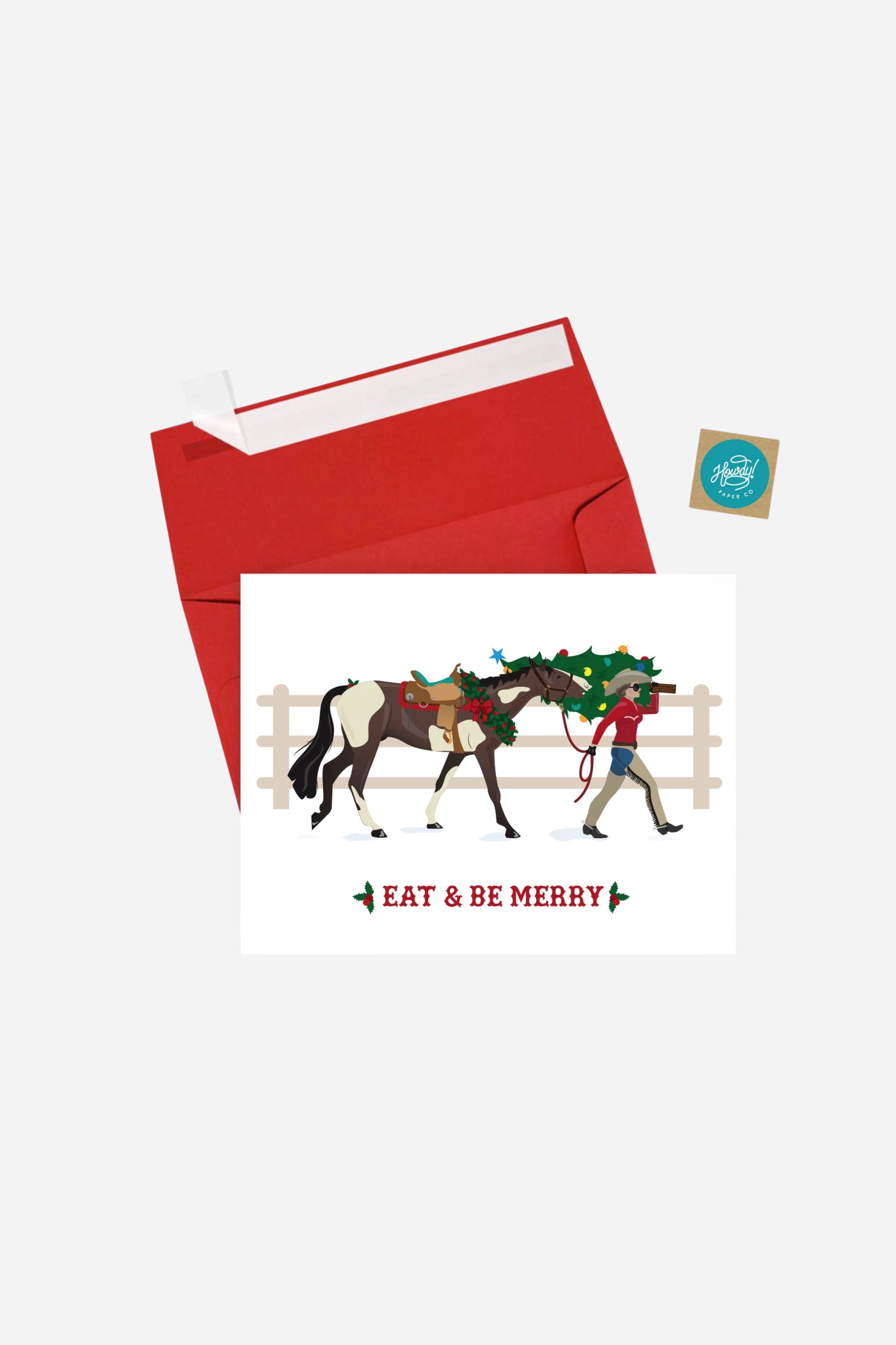 Be Merry Western Christmas card featuring a festive equestrian design printed on premium A2 14 pt unfinished card stock. Blank inside and packaged in a cellophane sleeve with matching envelope and seal. Perfect holiday greeting card for horse lovers and western style enthusiasts. Made in the USA. equestrian stationery, horse themed greeting cards, horse Christmas card, western holiday card, gifts for horse lovers, cowboy Christmas card, equestrian holiday stationery, horse lover card