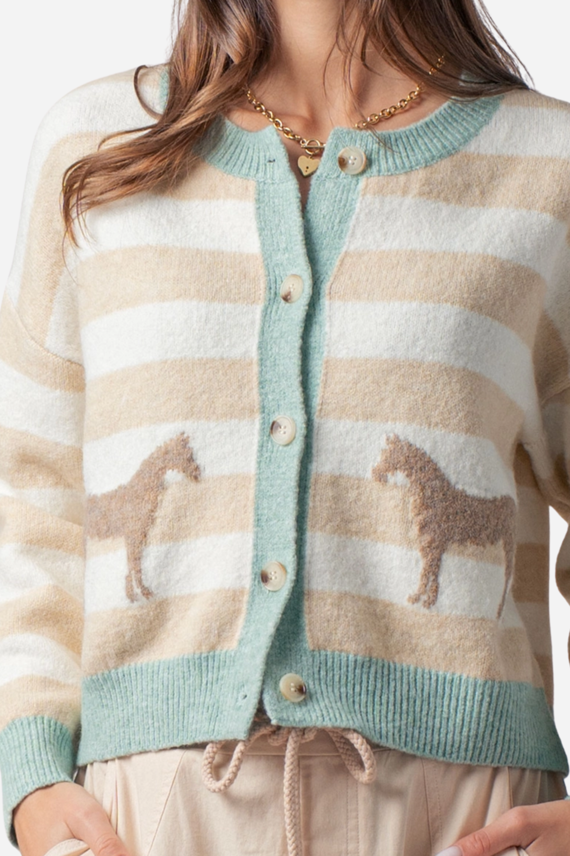 Cozy striped crew neck cardigan with twin horse jacquard motifs on the front, featuring a relaxed fit, full button-front closure, and ribbed trim at the neckline, cuffs, and hem.