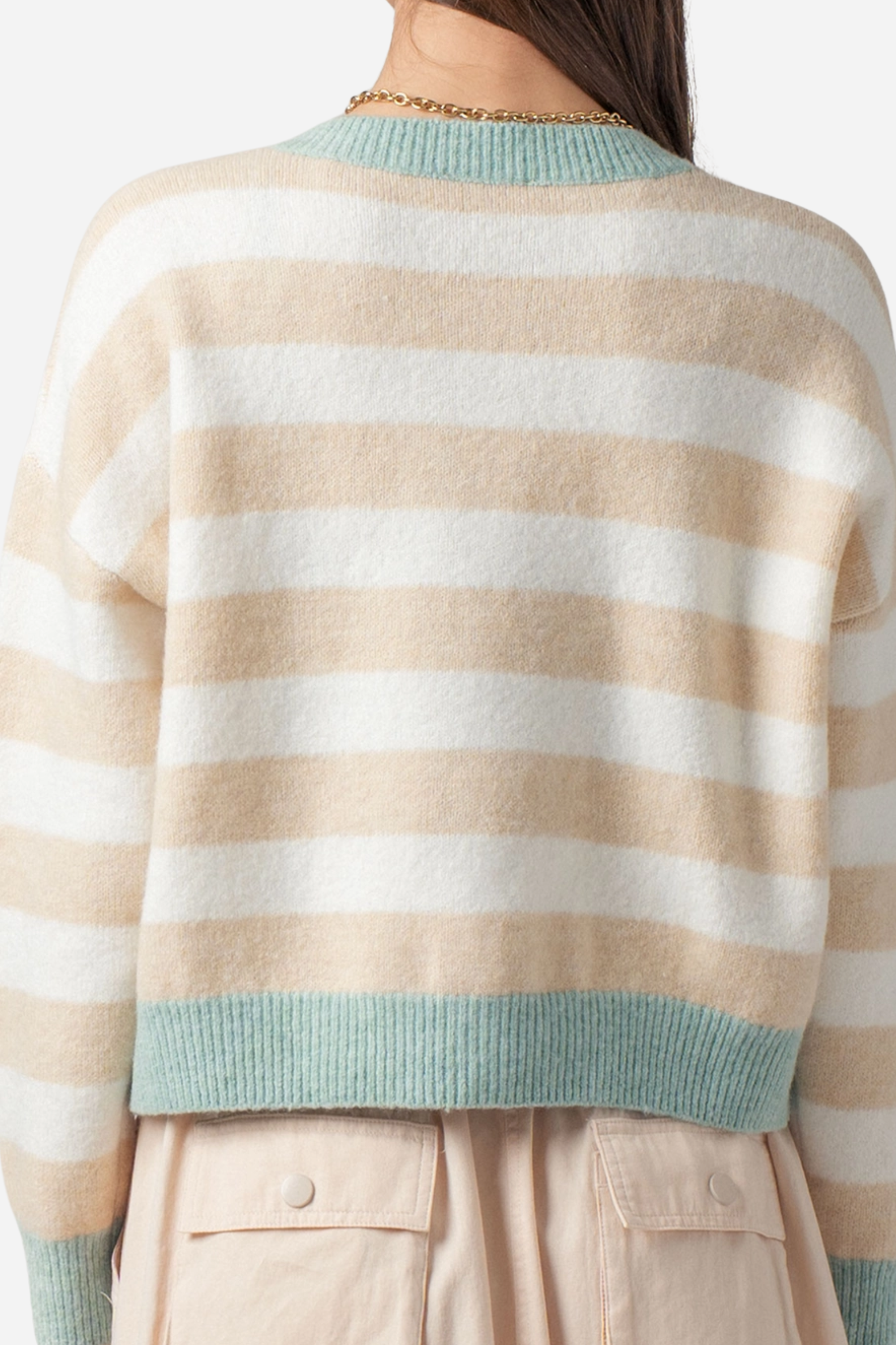 Cozy striped crew neck cardigan with twin horse jacquard motifs on the front, featuring a relaxed fit, full button-front closure, and ribbed trim at the neckline, cuffs, and hem.