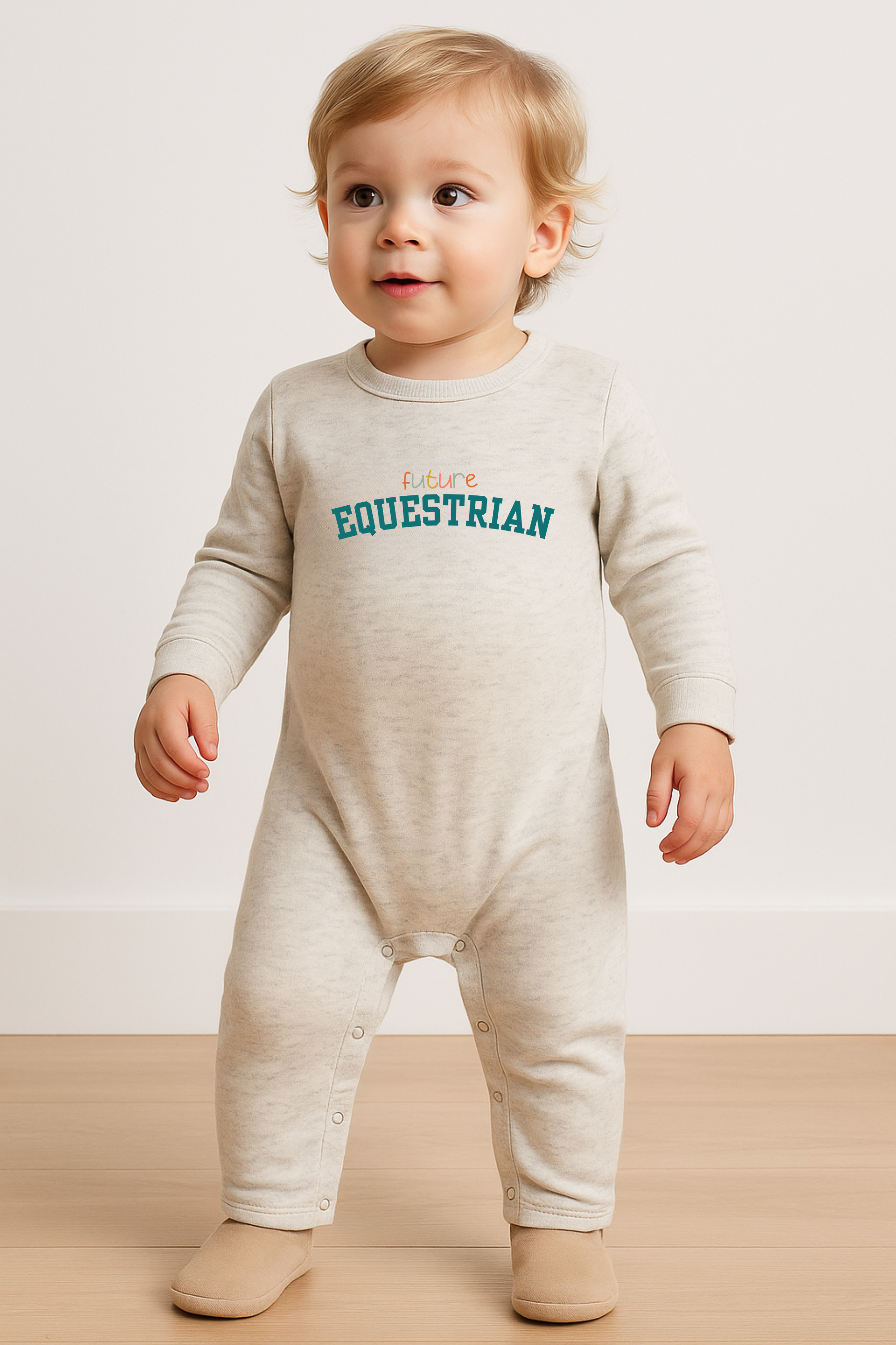 Future Equestrian baby onesie made from ultra-soft cotton/poly fleece blend featuring playful ‘Future Equestrian’ text. Cozy unisex fit with full snap closure bottom and two-snap back for easy changing. Available in sizes 6–12 months, 12–18 months, and 18–24 months. Perfect baby gift for horse lovers and young riders. Future Equestrian Onesie, baby equestrian outfit, horse lover baby gift, equestrian baby clothes, toddler horse onesie, unisex baby romper, horse themed infant apparel, cozy fleece 