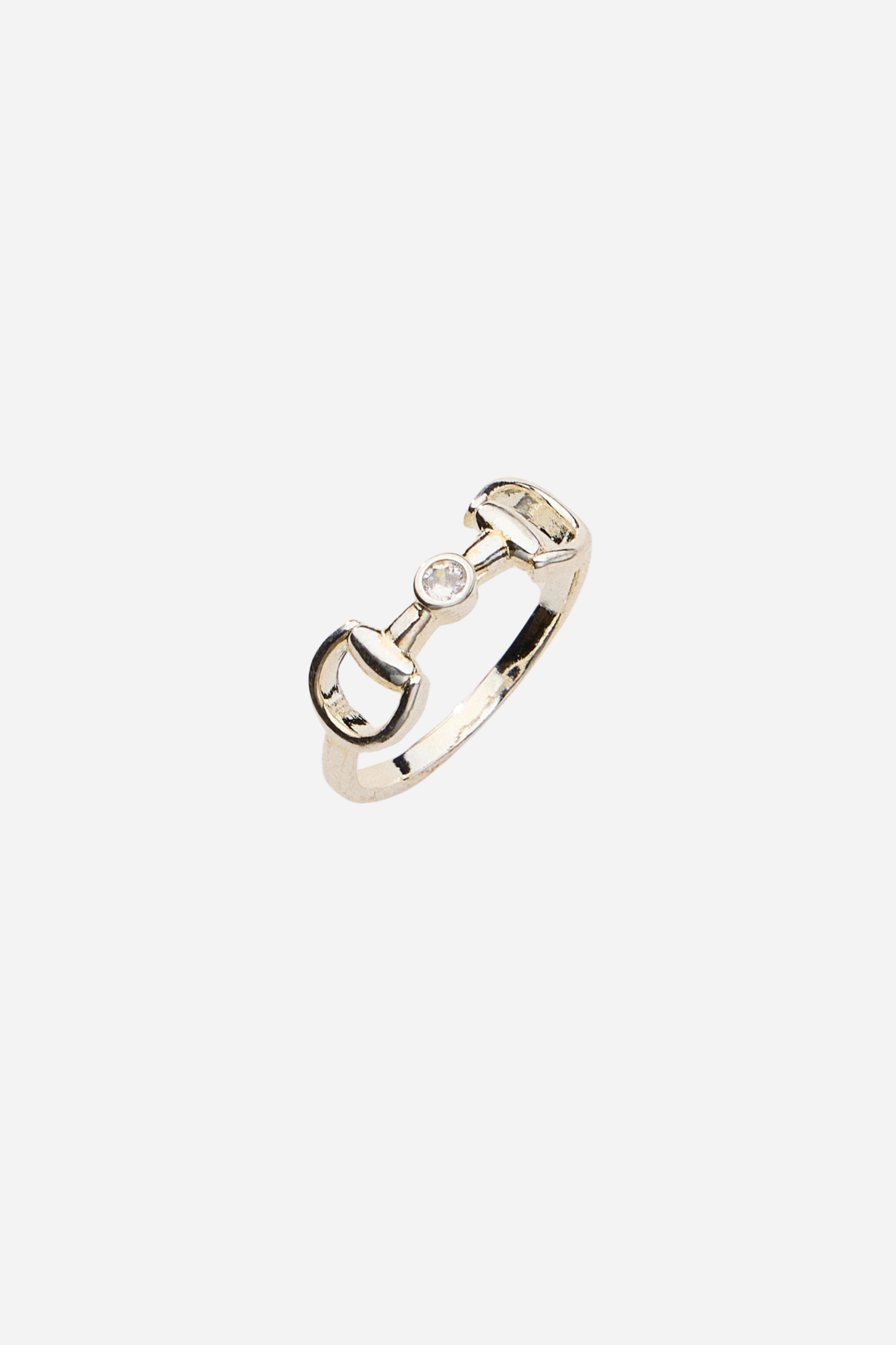 Polished silver horse bit ring with a bezel-set crystal accent, inspired by equestrian design and crafted for everyday wear.