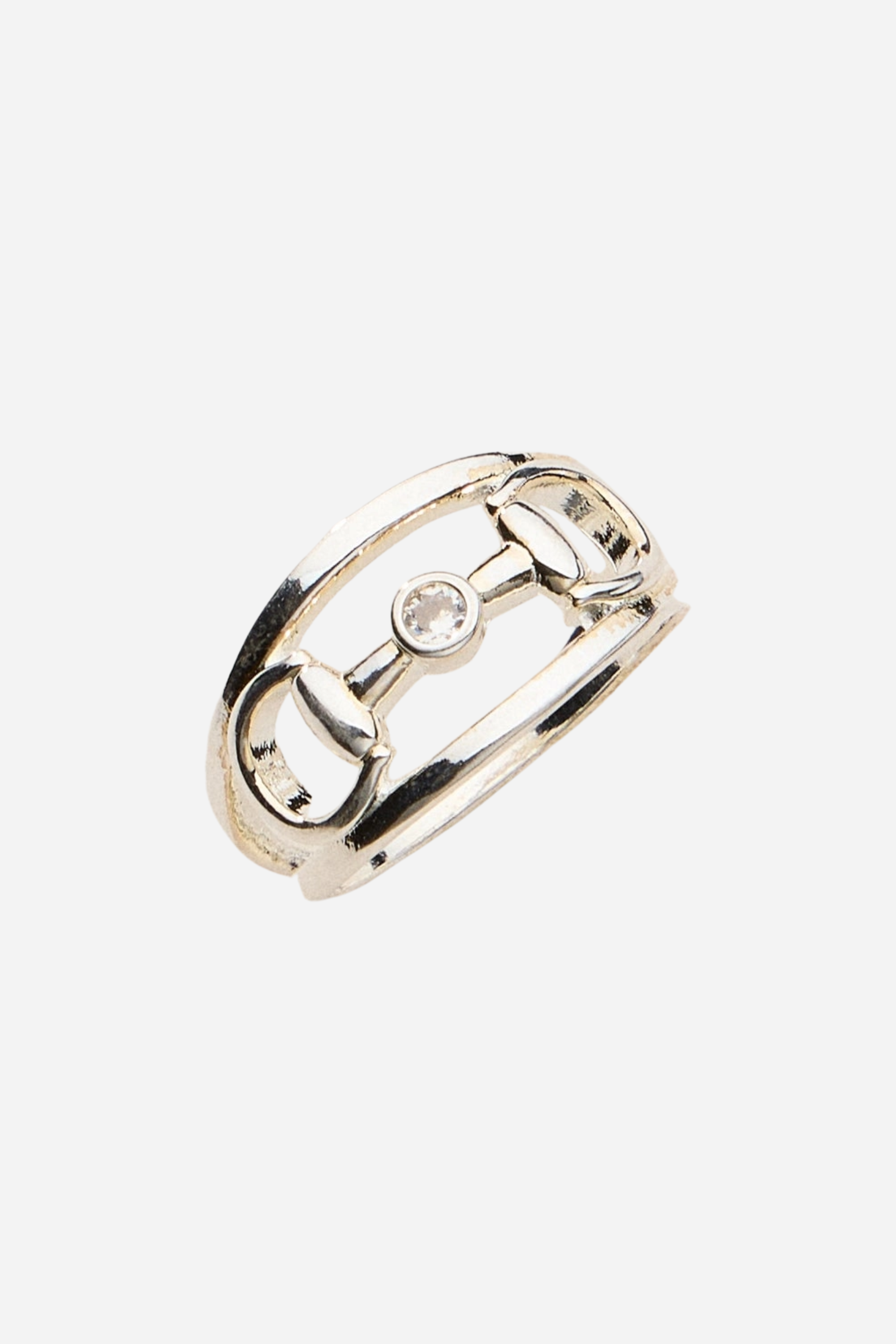 Silver Hollis double band ring featuring an equestrian horse bit centerpiece with a bezel-set crystal and minimalist stacked band design.