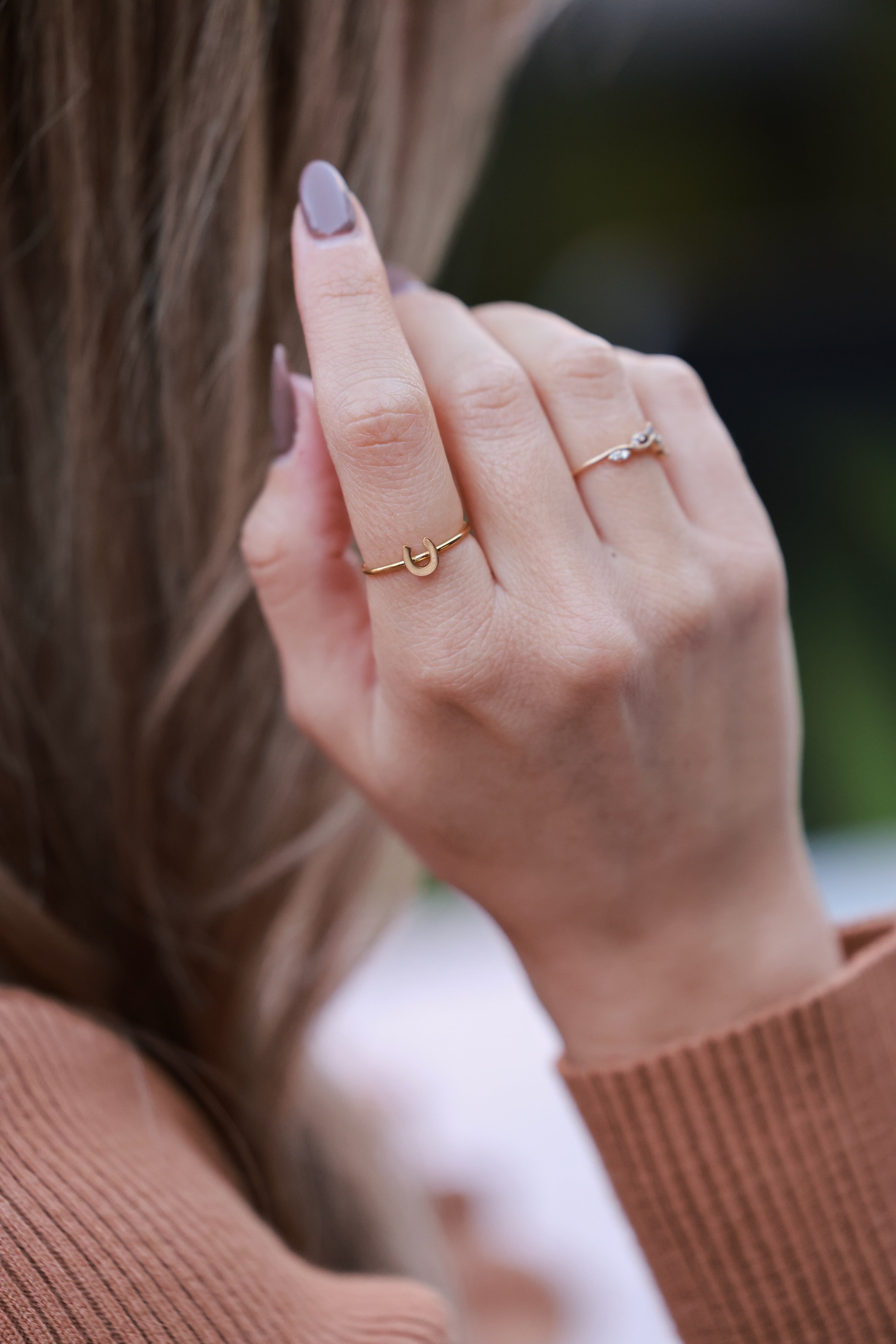Gold Horseshoe Stacking Ring in 18K gold-plated, water- and tarnish-resistant, hypoallergenic design. Dainty minimalist equestrian ring featuring a classic horseshoe symbol — perfect for stacking or gifting to horse lovers.