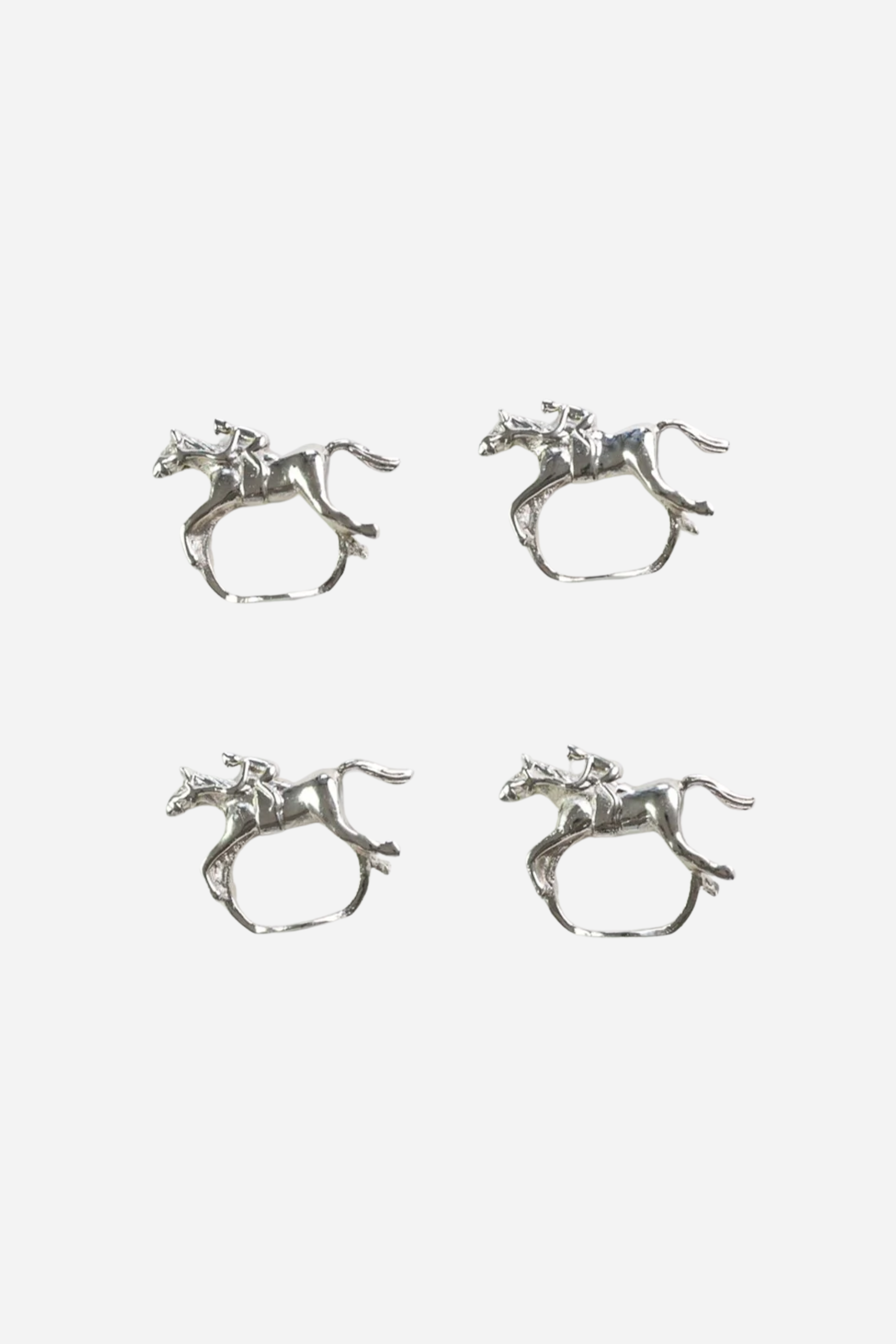 Pomegranate Jockey Napkin Ring Set - Silver Bring a touch of luxury to your table with the Silver Jockey Napkin Rings. This set of four features a stunning horse & jockey design that shines at every gathering. Ideal for formal dinners or casual brunches, these napkin rings are the perfect accessory to elevate your dining decor.