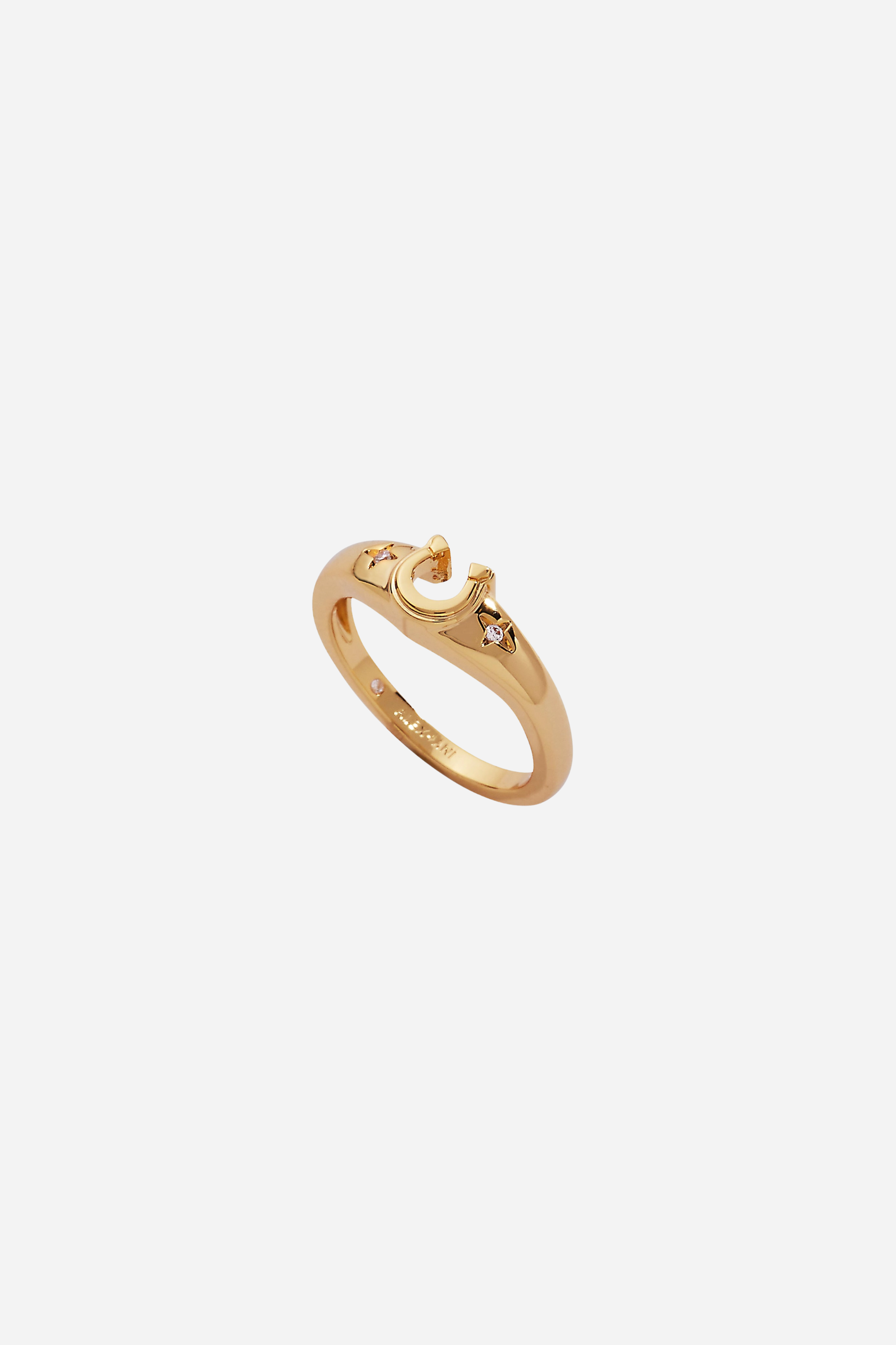 Gold-plated horseshoe signet ring featuring sparkling star-set crystal accents, designed as a lucky equestrian-inspired statement piece.