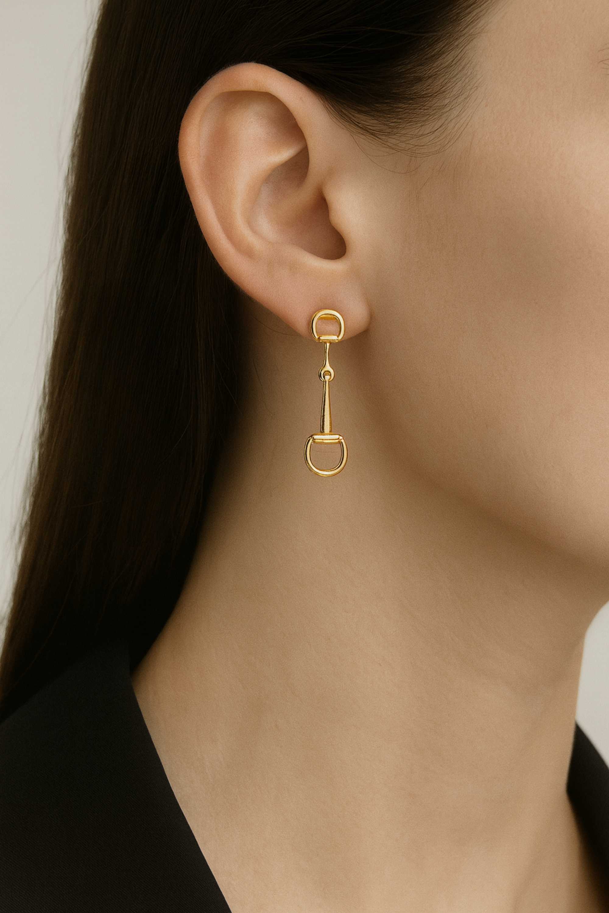 Gold equestrian dangle earrings with horse bit design, lightweight 18k gold drop earrings for women, dainty horse girl jewelry, elegant gift for equestrian lovers.