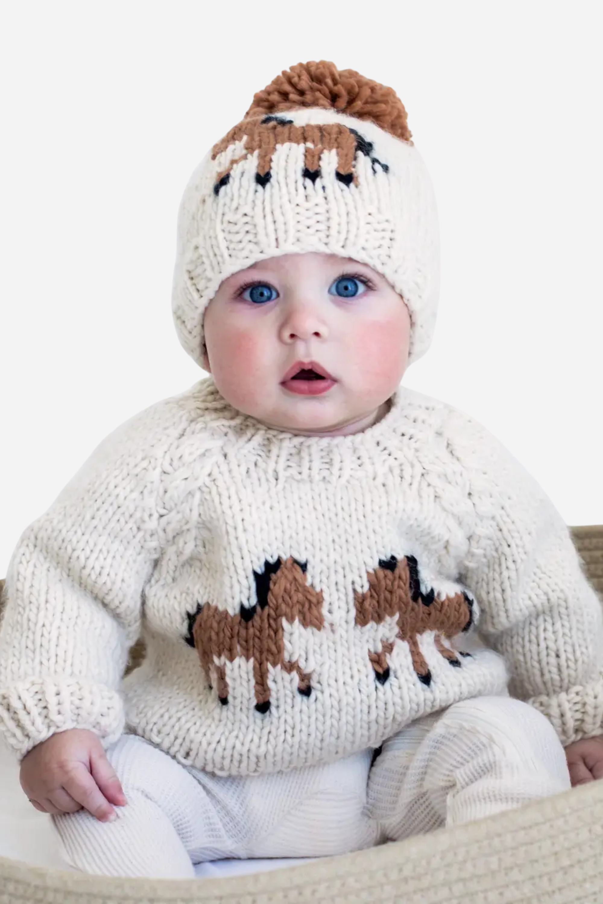 Handmade kids’ pony sweater in soft natural yarn, featuring a cute pony design on the front, raglan sleeves, and cable knit accents. Cozy, sustainable equestrian-inspired children’s clothing made from recycled polyester and acrylic blend.