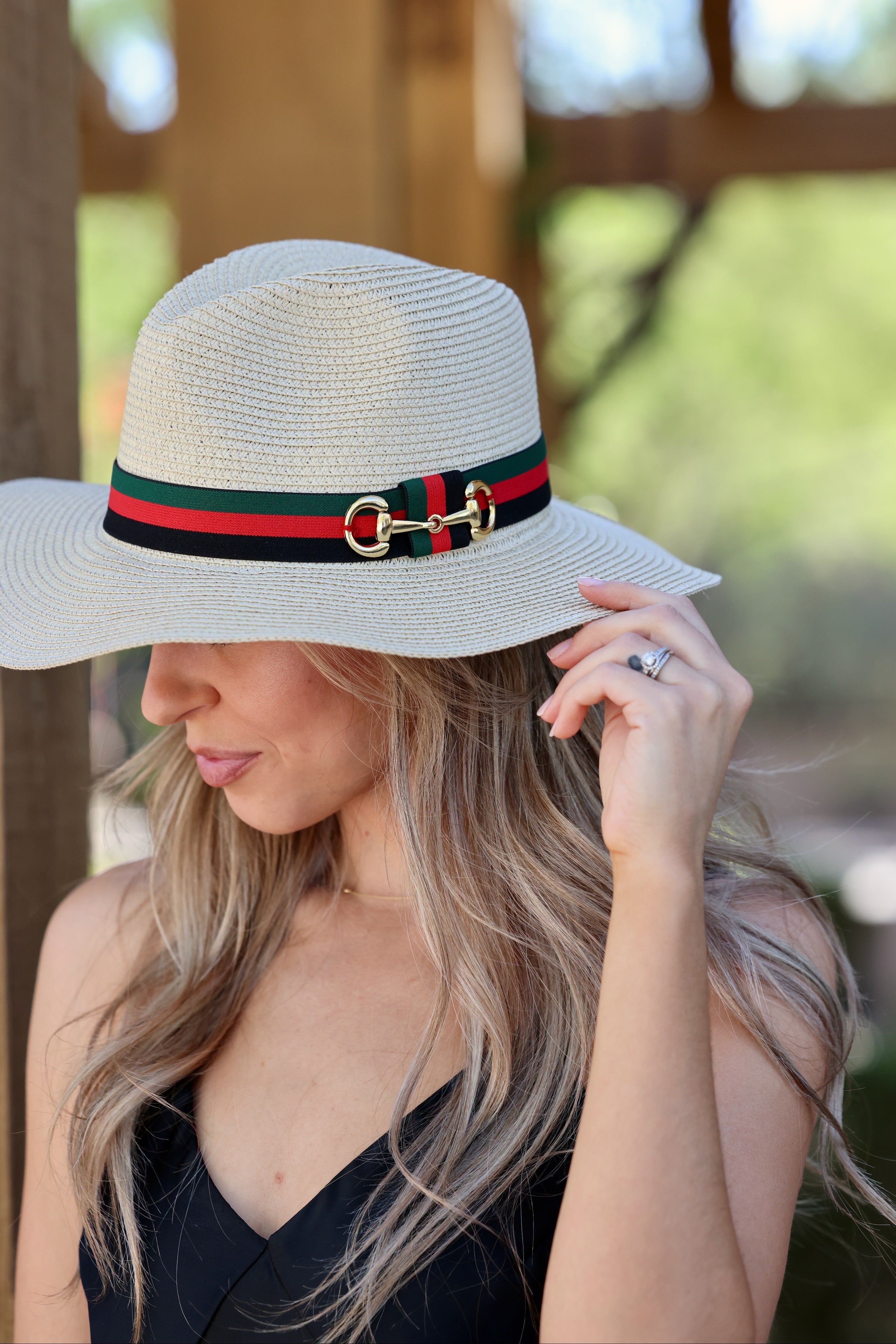 Equestrian-inspired panama sun hat with stripe ribbon, horse bit detail, and adjustable inner band. sun hat, straw sun hat, panama hat, paper straw hat, summer hat, wide brim hat