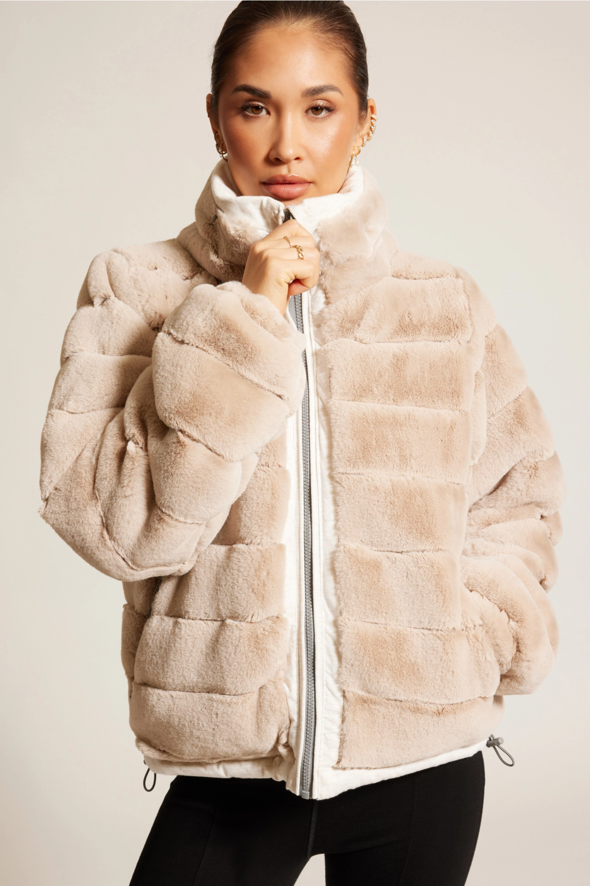 Reversible Puffer Jacket - Cloud Dancer, Reversible puffer jacket, Faux fur lined coat, Winter adventure jacket, Black insulated puffer, Stylish outdoor layer, The Adventurer Puffer Jacket is the perfect layer of luxury and warmth for your outdoor adventures. Crafted with reversible styling, adjustable waist drawstrings, and a faux fur lining for those chilly days, this jacket pairs fashion and function. Plus, thumbholes and a hidden hood in the collar guarantee comfort and convenience. 
