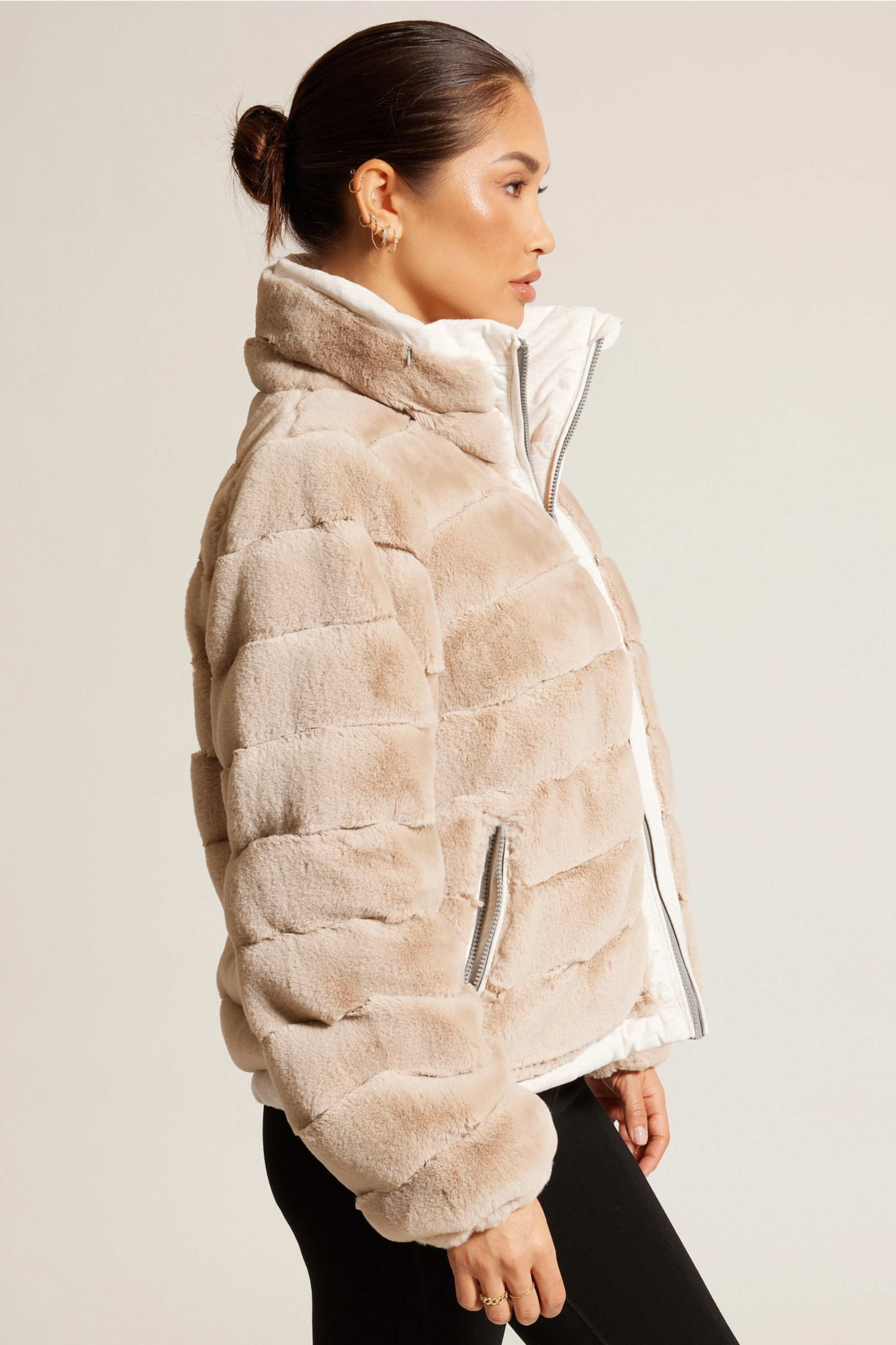 Reversible Puffer Jacket - Cloud Dancer, Reversible puffer jacket, Faux fur lined coat, Winter adventure jacket, Black insulated puffer, Stylish outdoor layer, The Adventurer Puffer Jacket is the perfect layer of luxury and warmth for your outdoor adventures. Crafted with reversible styling, adjustable waist drawstrings, and a faux fur lining for those chilly days, this jacket pairs fashion and function. Plus, thumbholes and a hidden hood in the collar guarantee comfort and convenience. 