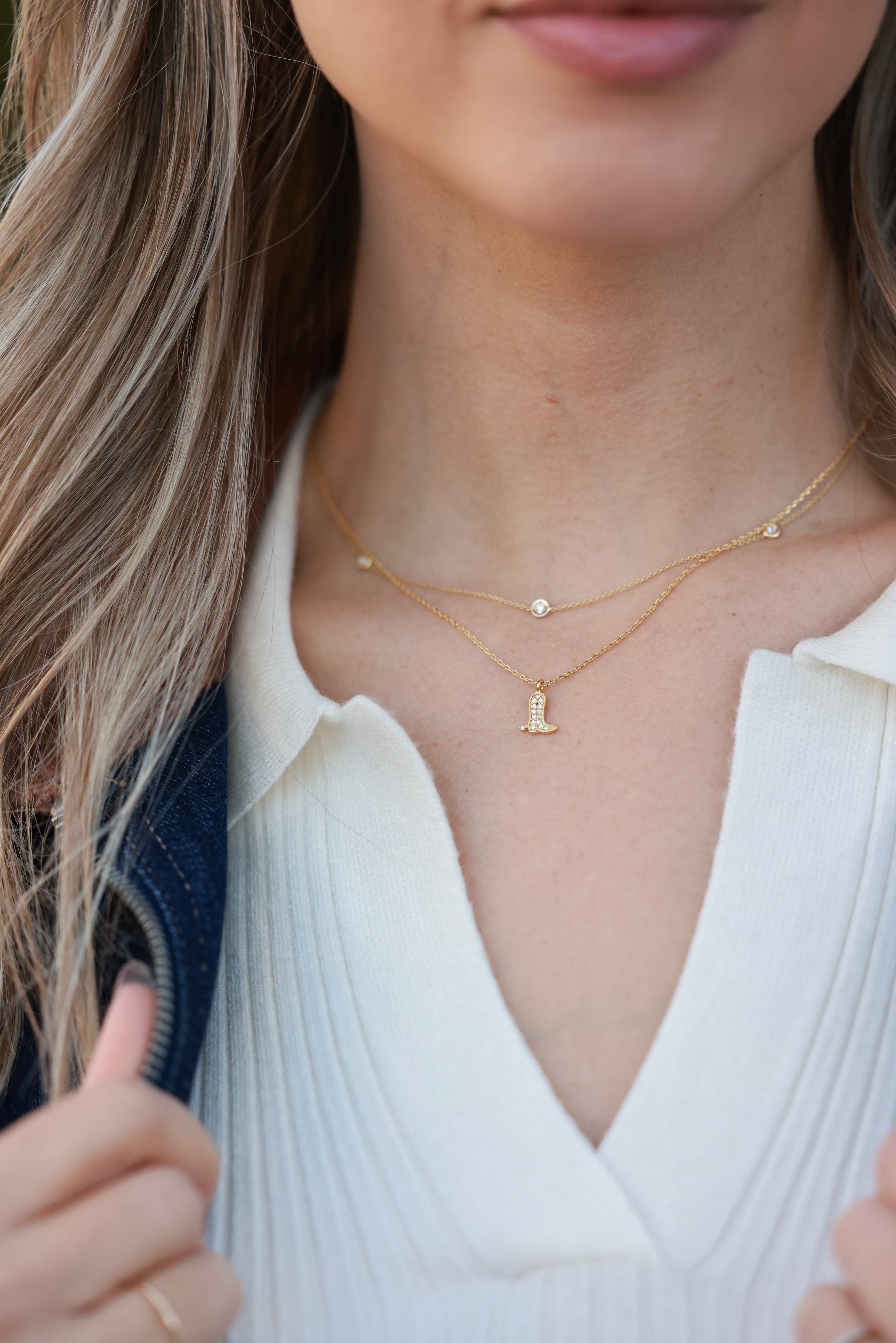 Sadie Boot Necklace in 14k gold-dipped sterling silver featuring a delicate chain and small western boot charm accented with CZ pavé detail. Dainty equestrian-inspired jewelry perfect for horse lovers and everyday chic style.