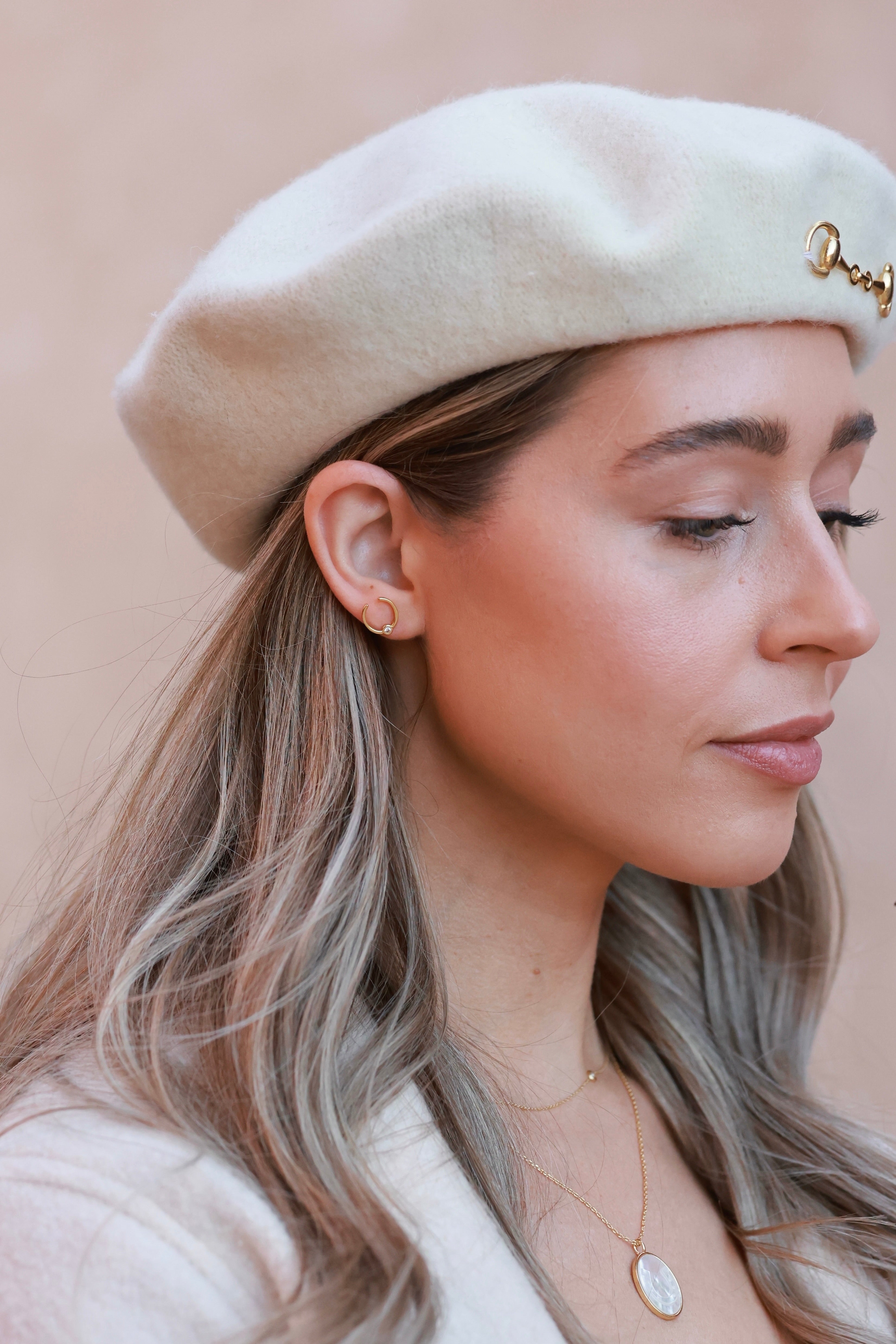 Sutton Horseshoe Earrings in 14k gold vermeil featuring delicate horseshoe design adorned with sparkling Swarovski crystals. Lightweight and elegant equestrian-inspired jewelry that adds timeless charm and subtle brilliance — perfect for horse lovers.