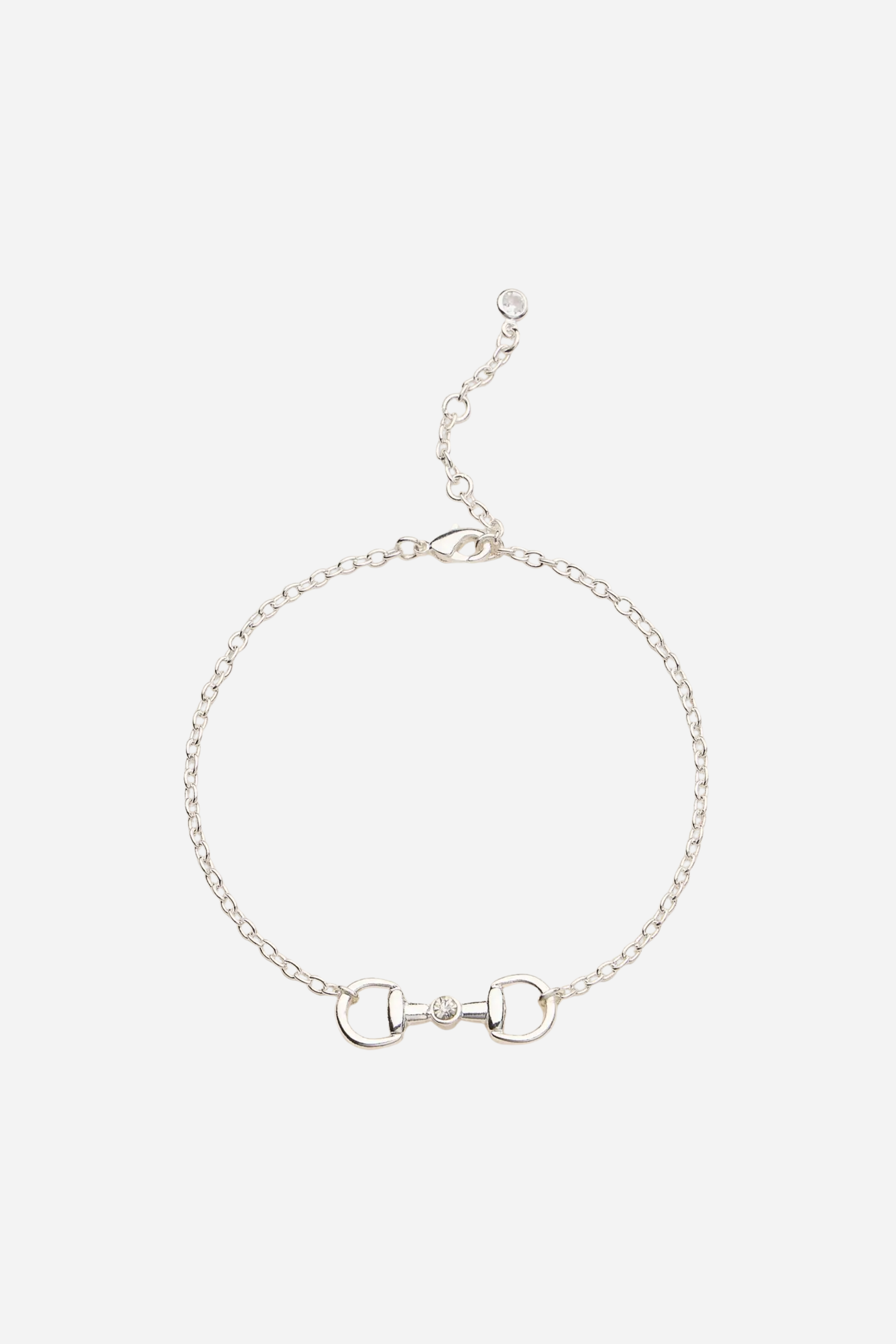 Gold bracelet with a horsebit clasp on a white background - equestrian inspired jewelry, horse girl accessory, horseshoe pendant necklace, dainty equestrian jewelry, small gifts for horse lovers
