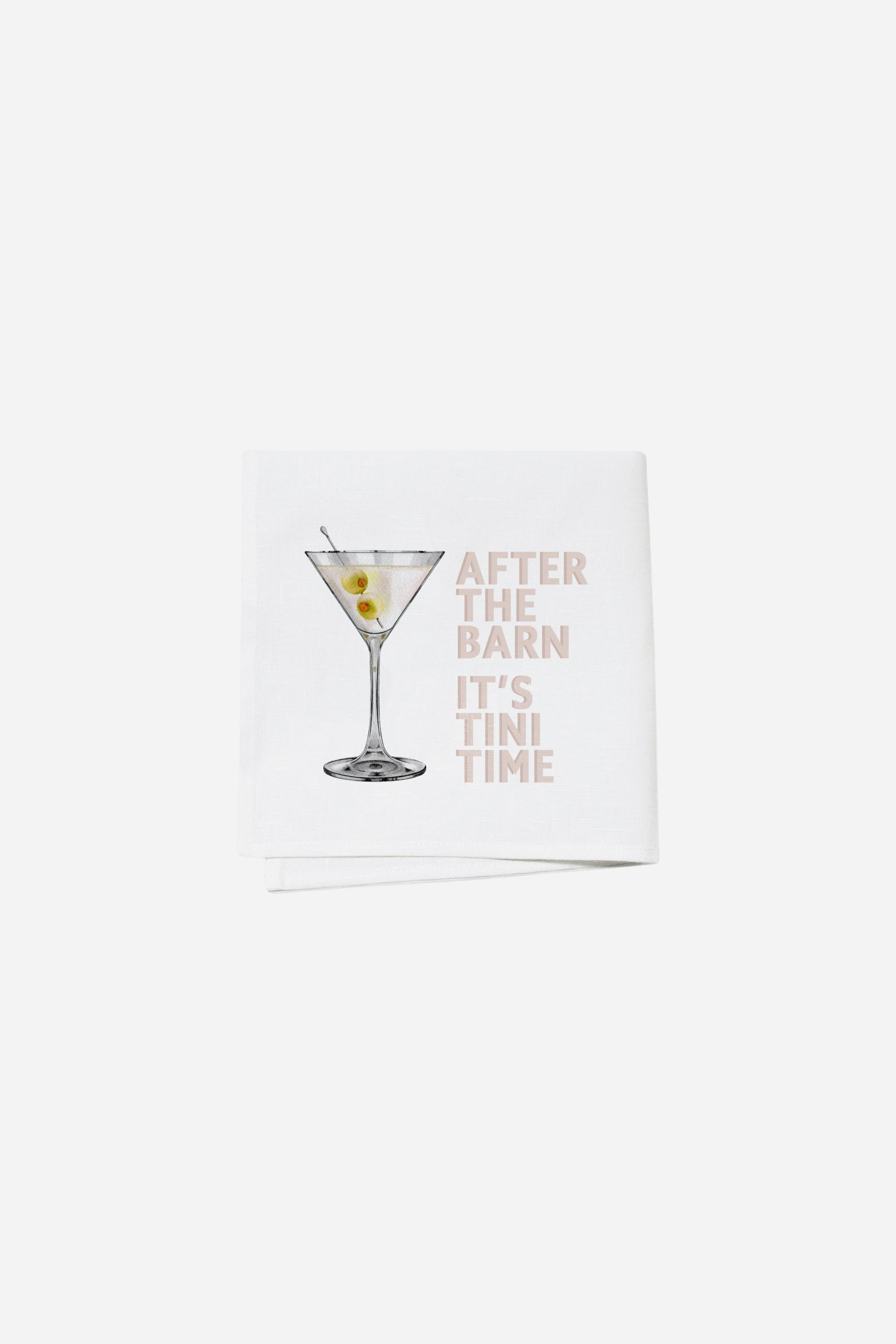 Toss Designs Tini Time Cocktail Napkin Set | After the barn it's tini time | A white cocktail napkin with a martini glass illustration, featuring two olives and a toothpick. Text reads, "After the barn, it’s tini time." | Tini Time cocktail napkins, horse lover gift, equestrian barware, funny cocktail napkins, barn-themed drink napkins, martini glass napkins, after barn cocktail napkins, equestrian entertaining accessories, polyduck napkin set, stylish equestrian home decor